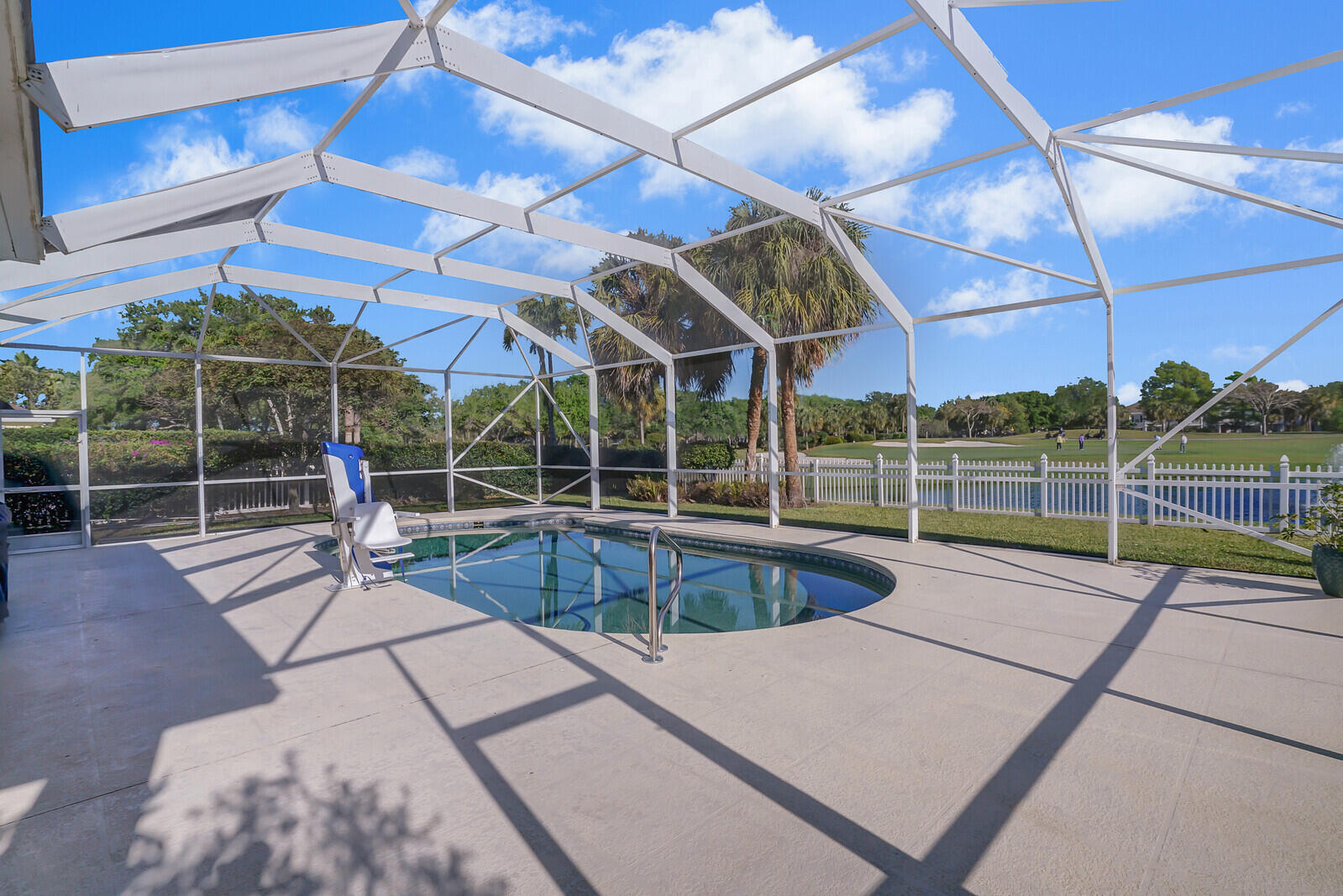 142 Barbados Drive Jupiter, FL 33458 - Photo 34 of 53 a view of a backyard with swimming pool