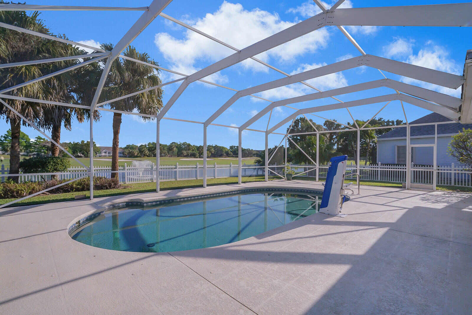 142 Barbados Drive Jupiter, FL 33458 - Photo 36 of 53 a view of a backyard with swimming pool