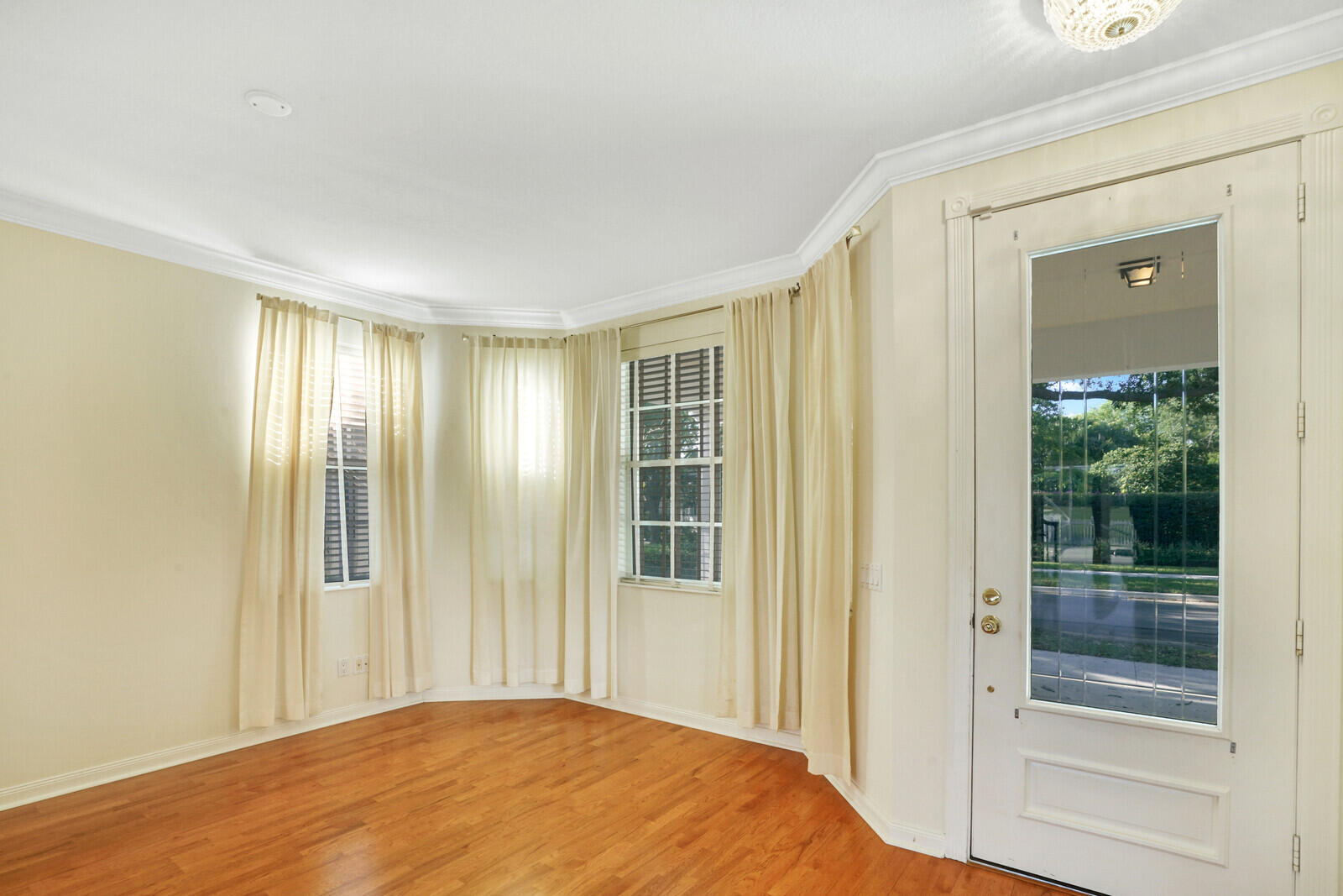 142 Barbados Drive Jupiter, FL 33458 - Photo 4 of 53 a bedroom with a bed and a window