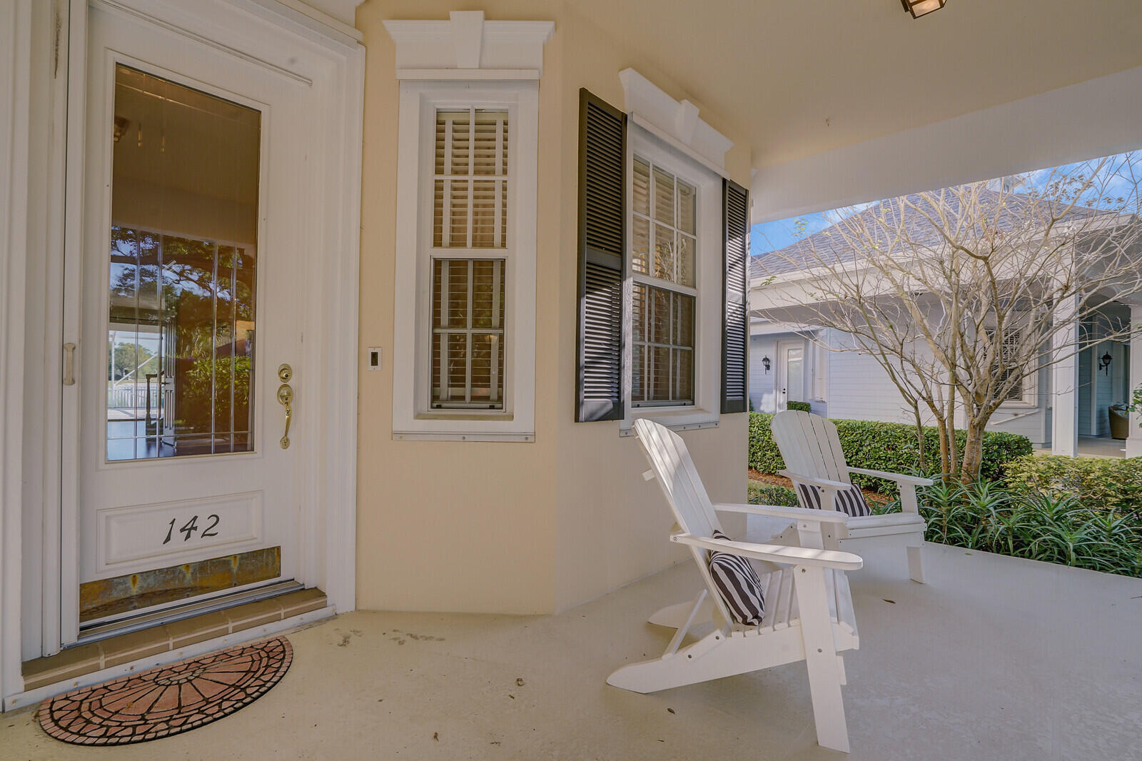 142 Barbados Drive Jupiter, FL 33458 - Photo 53 of 53 a view of a house with backyard and sitting area
