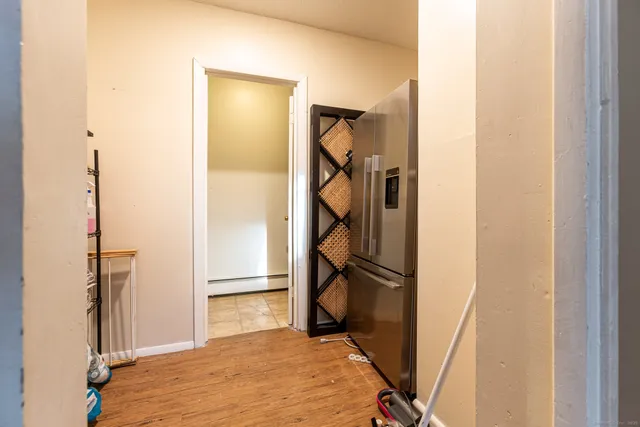 a bedroom with a bed and dresser