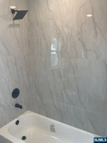 a bathroom with a bathtub