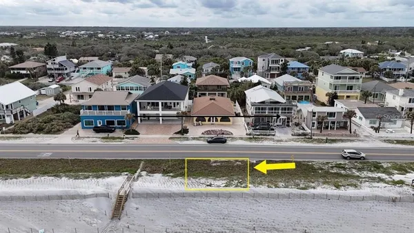 an aerial view of residential house with swimming pool