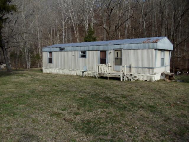 785 Cates Road Lawrenceburg, TN 38464 - Photo 11 of 17 a view of a house with backyard