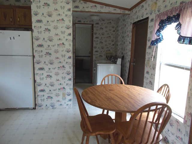 785 Cates Road Lawrenceburg, TN 38464 - Photo 4 of 17 a view of a dining room with furniture