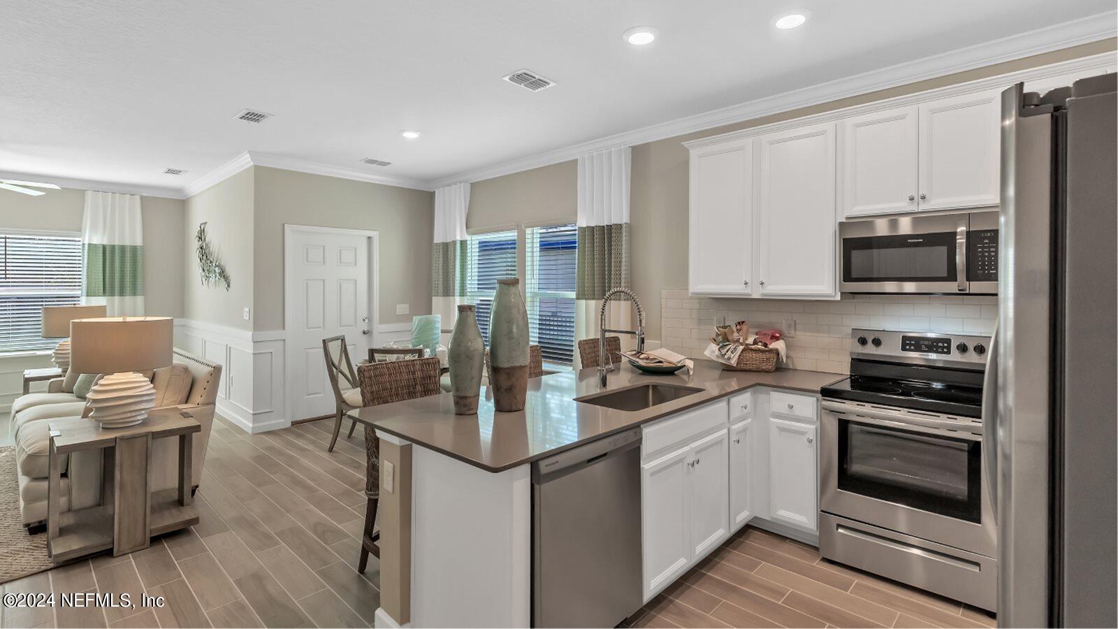 1689 Pacifico Way Jacksonville, FL 32211 - Photo 3 of 15 JAX_1781_Rend_Truman_Kitchen3_F1