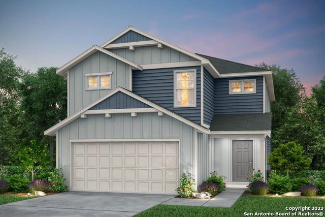 11346 Long Rider San Antonio, TX 78254 - Photo 1 of 1 a front view of a house with garden