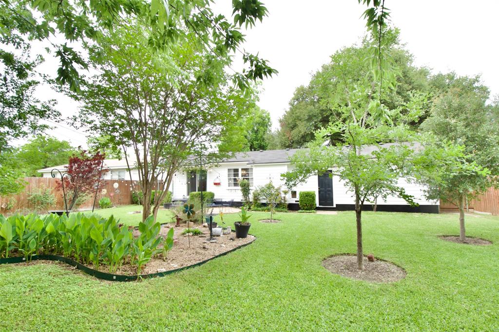 1307 North 65th Street Waco, TX 76710 - Photo 29 of 35 a garden with tall trees