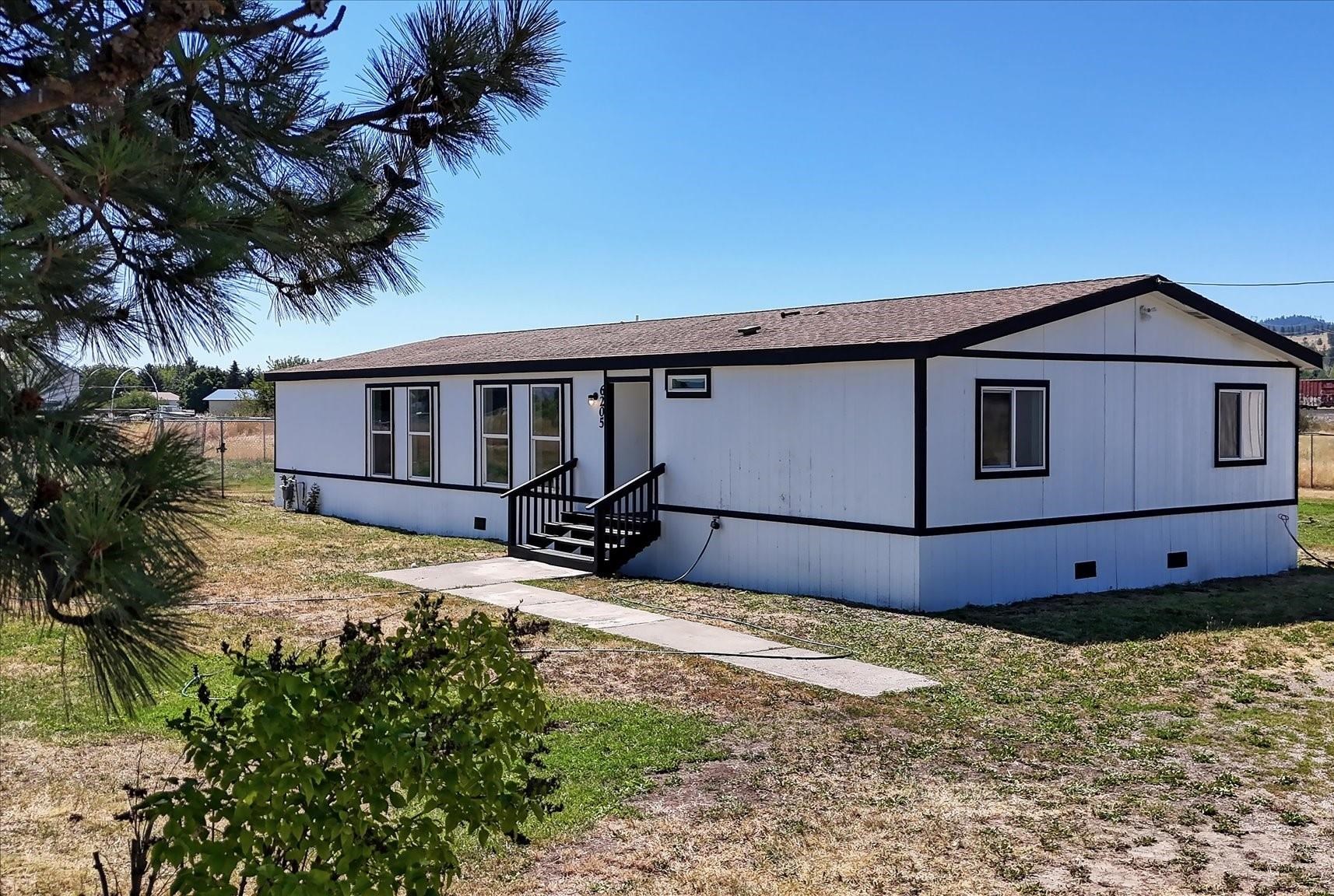 6205 North Ormond Road Otis Orchards, WA 99027 - Photo 1 of 13