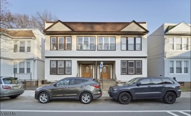 a car parked in front of a house
