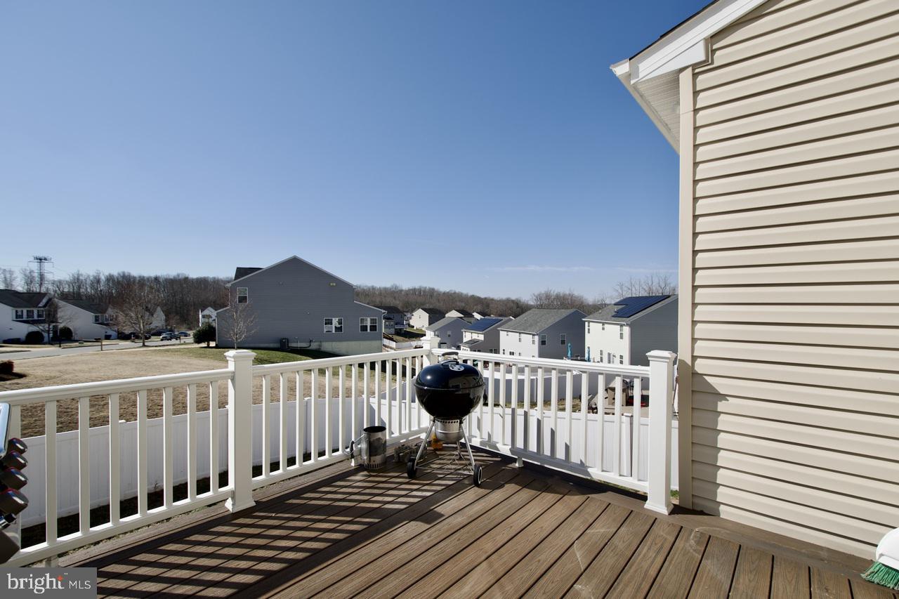 21 Runyon Drive Stafford, VA 22554 - Photo 18 of 43 a view of a roof deck with wooden floor and fence