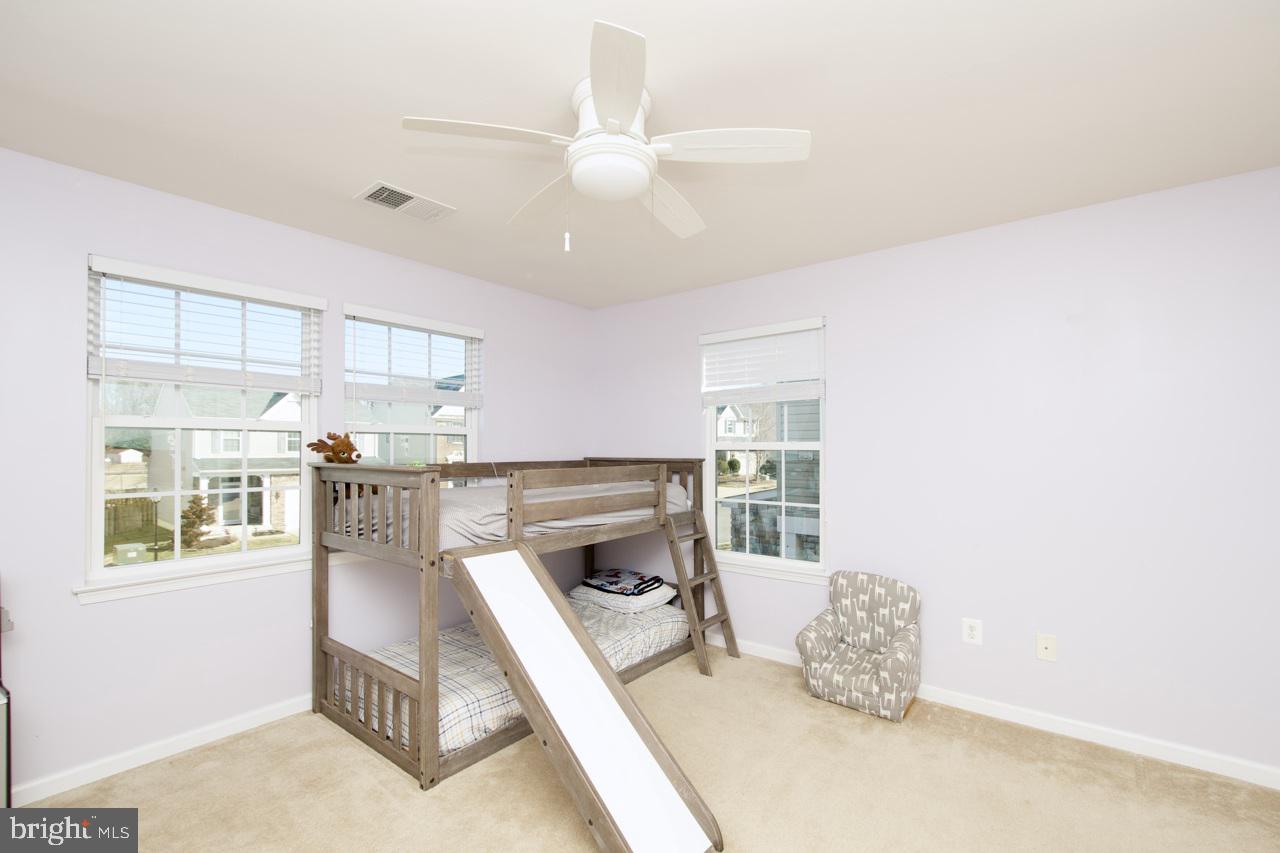 21 Runyon Drive Stafford, VA 22554 - Photo 21 of 43 a living room with furniture and a fireplace