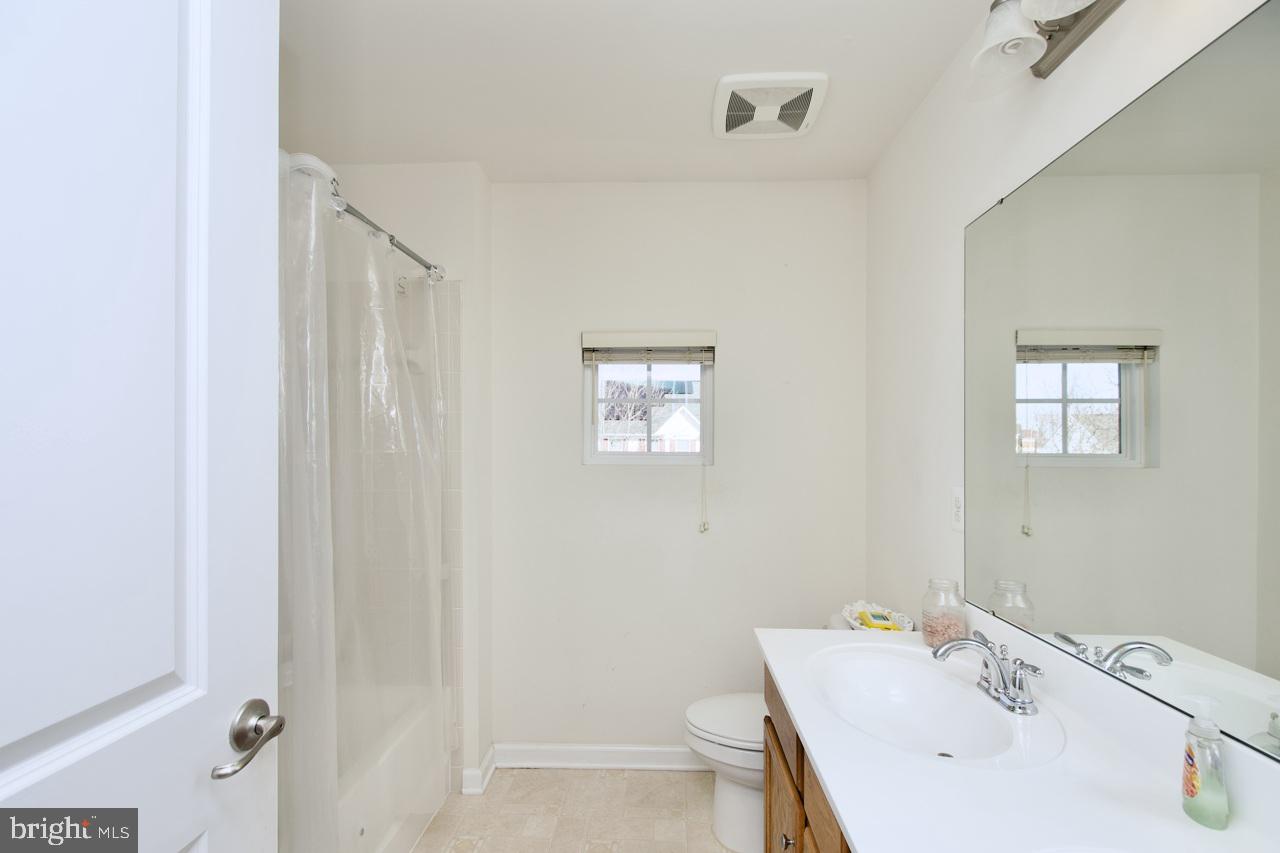 21 Runyon Drive Stafford, VA 22554 - Photo 23 of 43 a bathroom with a sink and a mirror