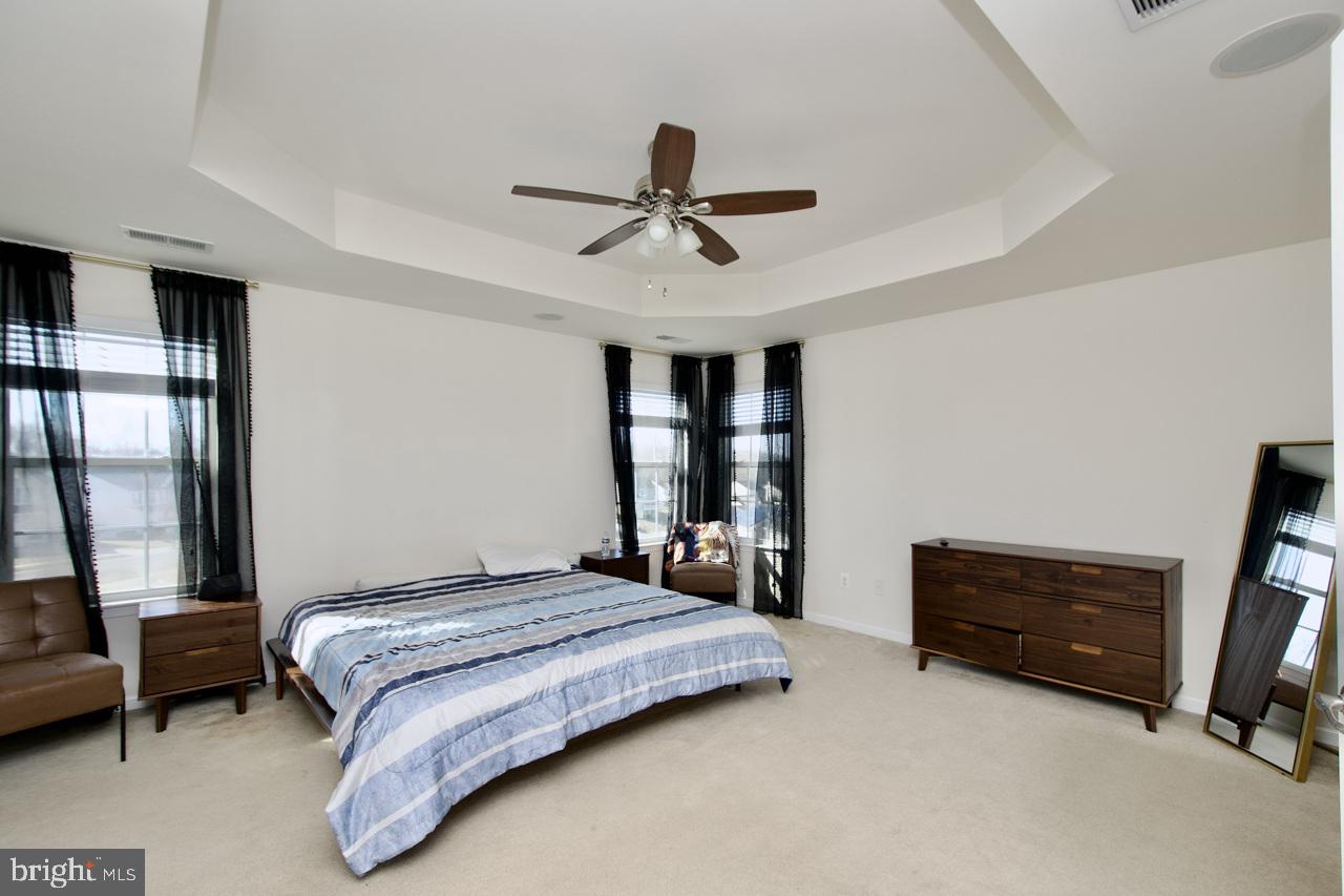 21 Runyon Drive Stafford, VA 22554 - Photo 28 of 43 a bedroom with a bed dresser and a window