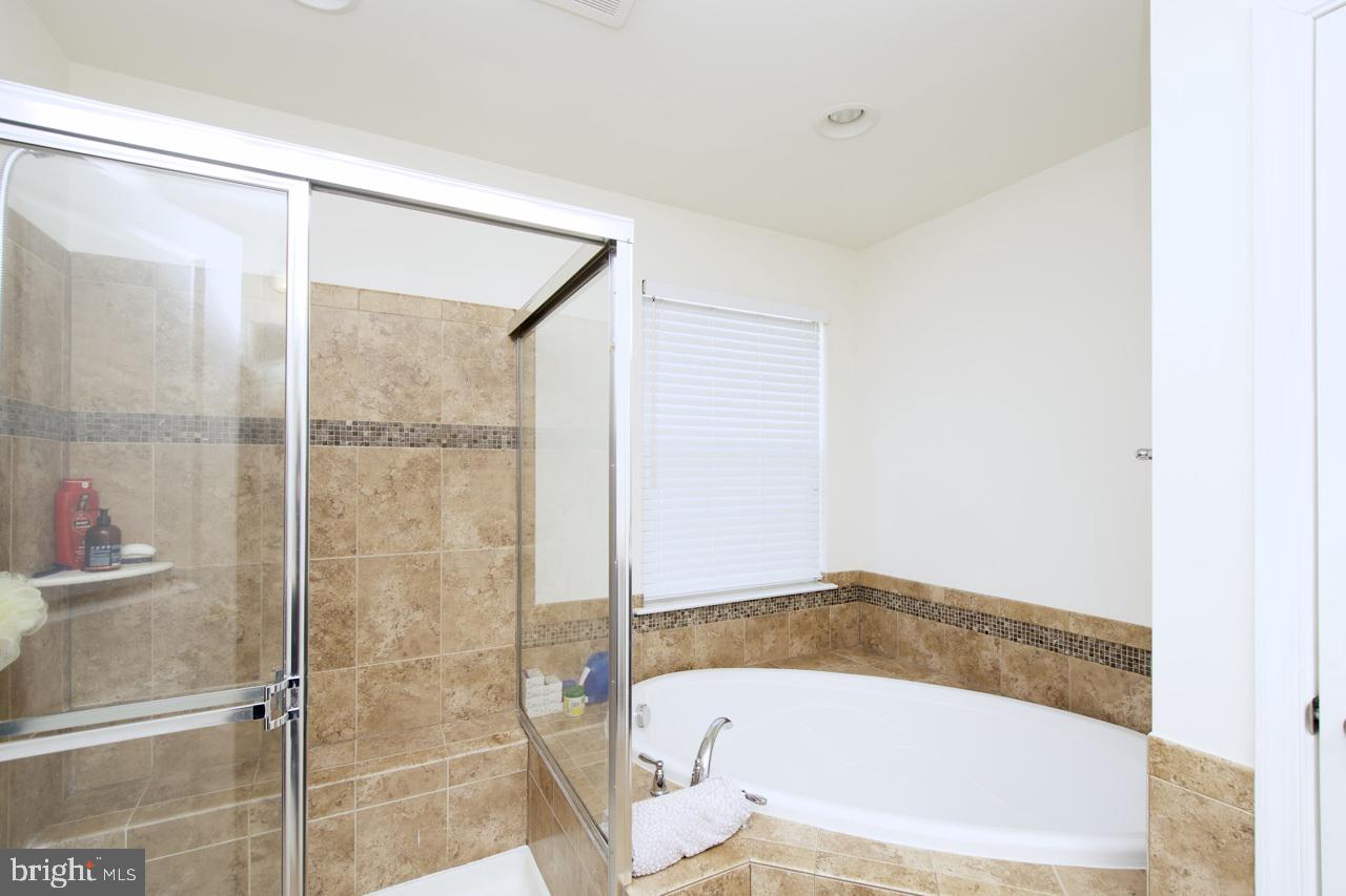 21 Runyon Drive Stafford, VA 22554 - Photo 33 of 43 a bathroom with a tub and shower