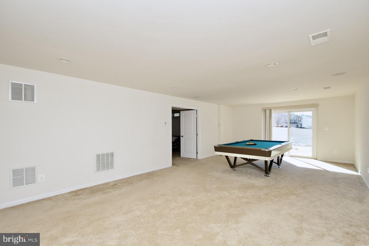 21 Runyon Drive Stafford, VA 22554 - Photo 35 of 43 a room with a table and a chair