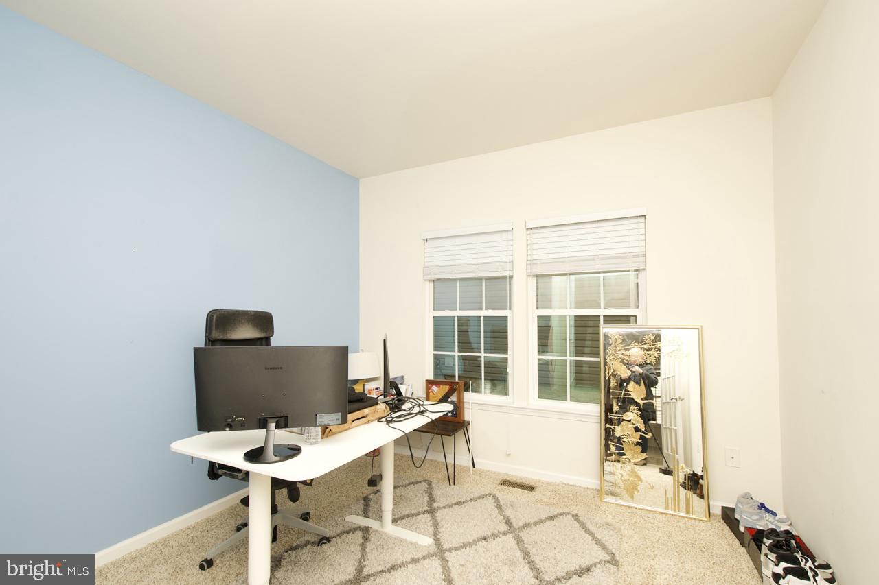 21 Runyon Drive Stafford, VA 22554 - Photo 4 of 43 a workspace with furniture and a window