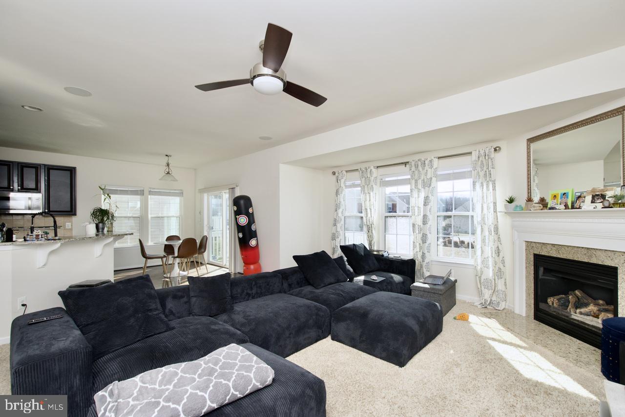 21 Runyon Drive Stafford, VA 22554 - Photo 7 of 43 a living room with furniture and a fireplace