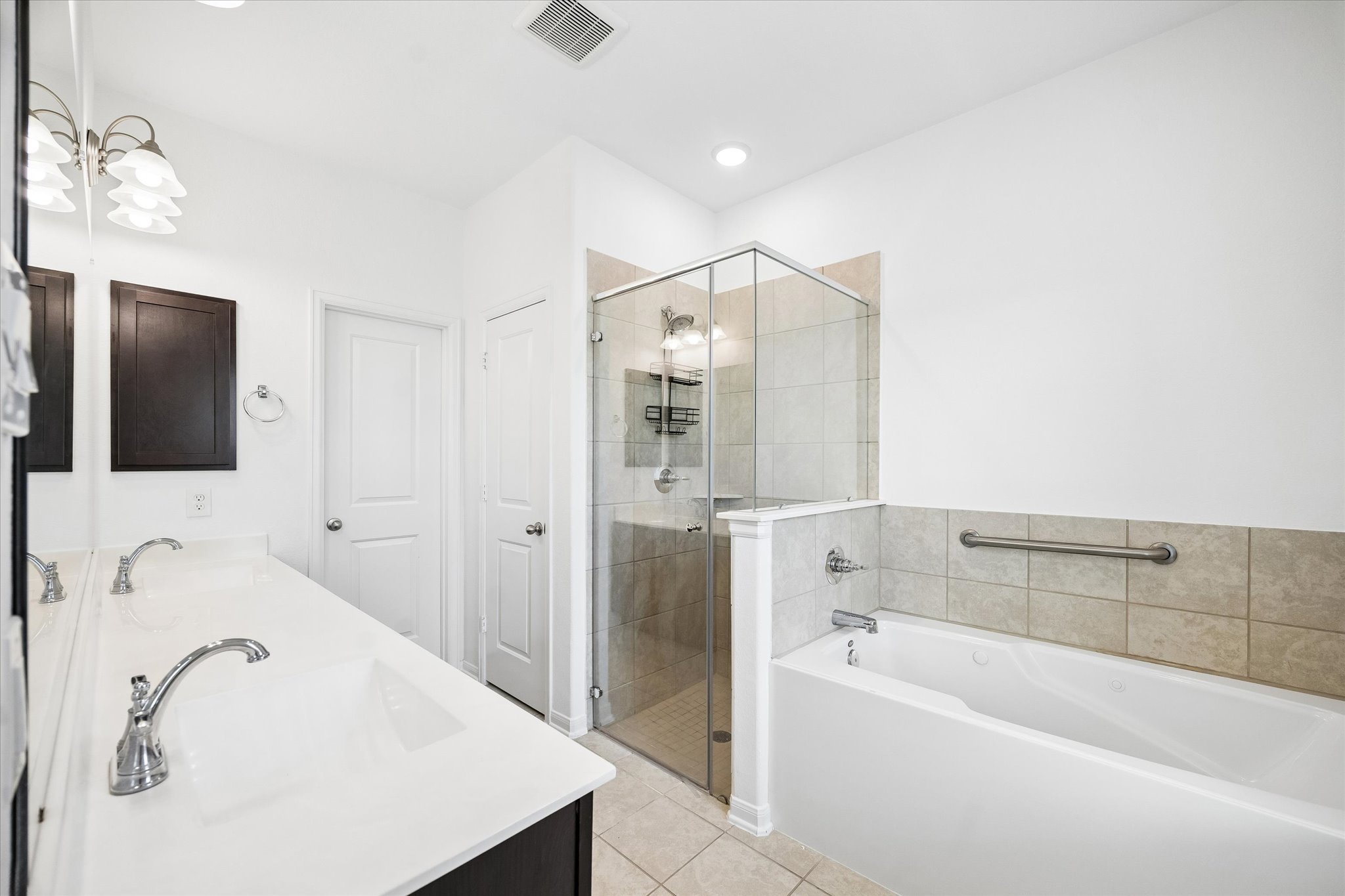 3354 Harmony View Lane Spring, TX 77386 - Photo 7 of 18 a bathroom with a bathtub and a sink
