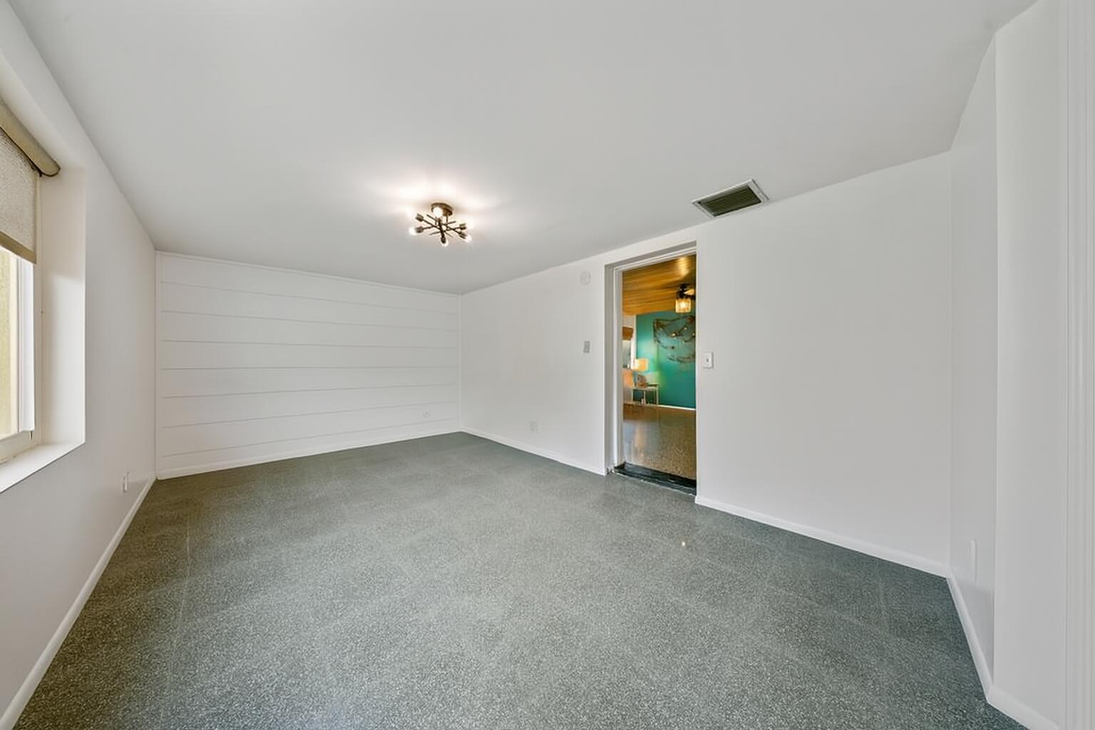 311 Granada Street Fort Pierce, FL 34949 - Photo 20 of 58 a view of an empty room with a window