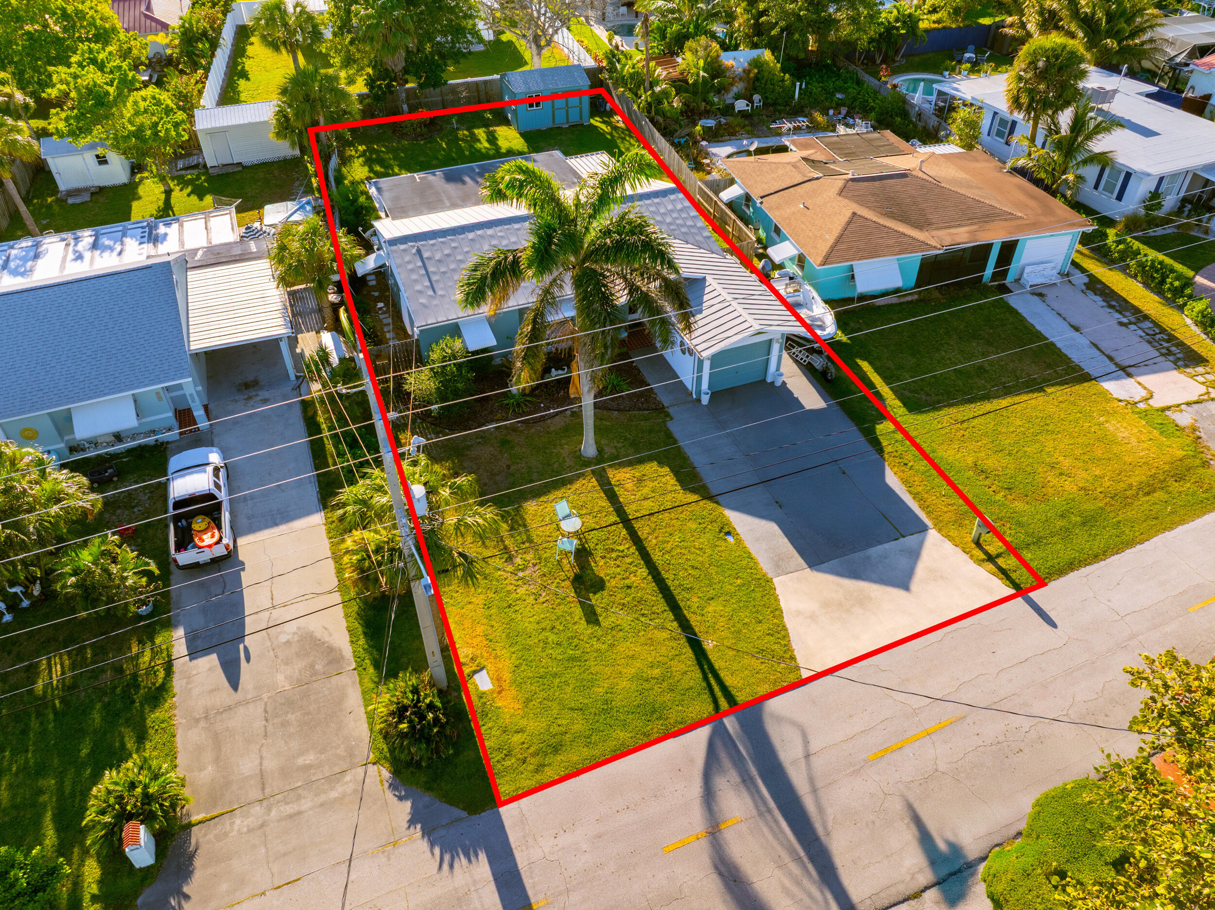 311 Granada Street Fort Pierce, FL 34949 - Photo 46 of 58 an aerial view of a house with swimming pool