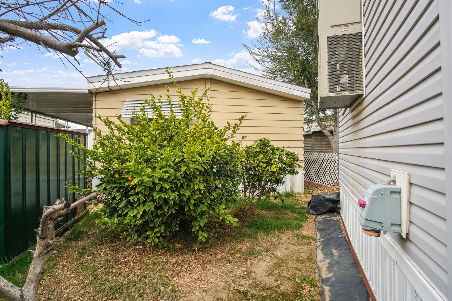 1400 Meredith Avenue, Unit 81 Gustine, CA 95322 - Photo 6 of 29 a view of a backyard with plants