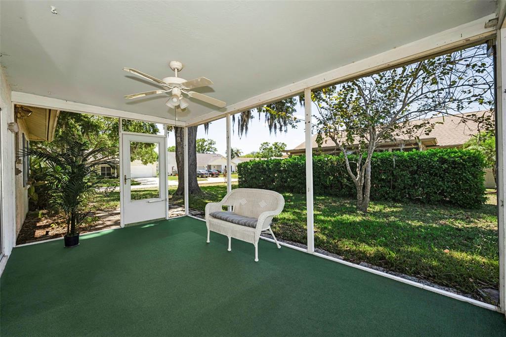 9427 Cape Charles Avenue New Port Richey, FL 34655 - Photo 27 of 82 a view of a chairs in backyard of the house