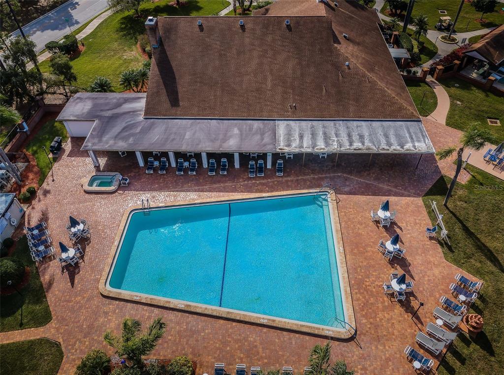 9427 Cape Charles Avenue New Port Richey, FL 34655 - Photo 71 of 82 an aerial view of a house with swimming pool