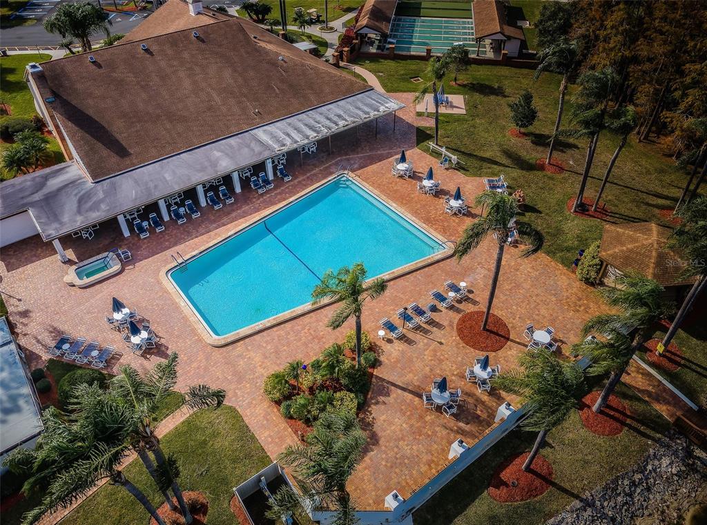 9427 Cape Charles Avenue New Port Richey, FL 34655 - Photo 73 of 82 an aerial view of a house with a swimming pool