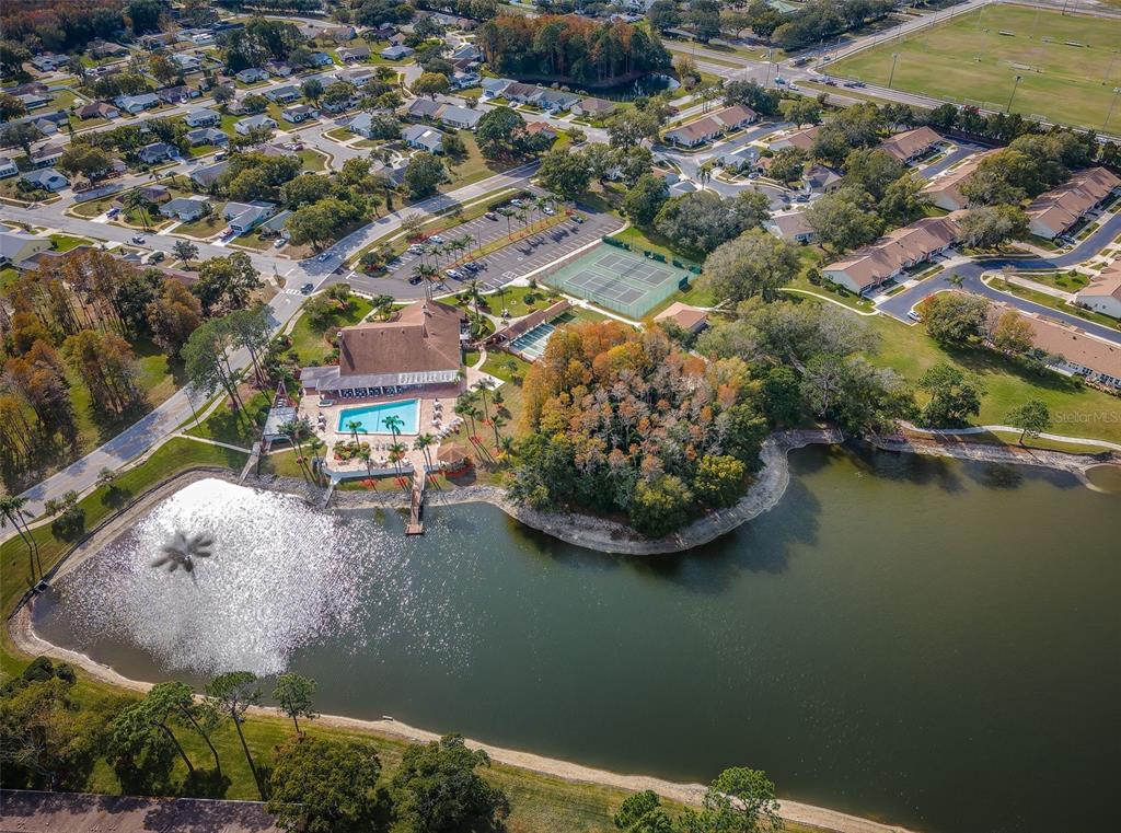9427 Cape Charles Avenue New Port Richey, FL 34655 - Photo 77 of 82 an aerial view of a house with a lake view