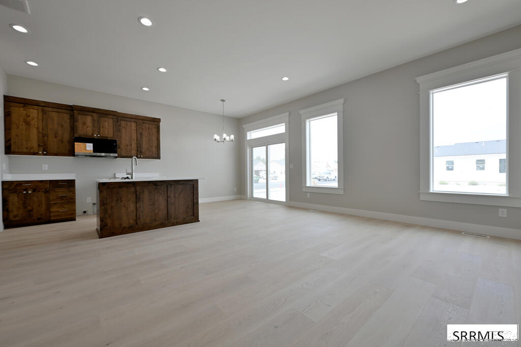 3043 Elixir Road Ammon, ID 83406 - Photo 2 of 15 Great Room to Kitchen/Dining Area