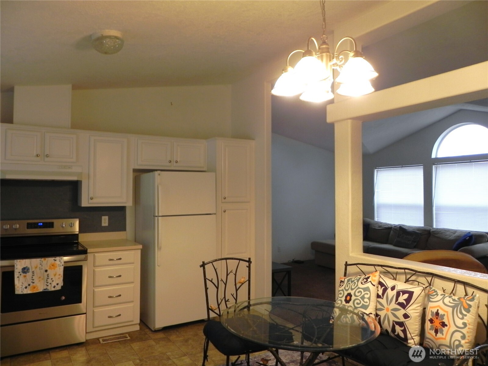 230 Silver Street Republic, WA 99166 - Photo 11 of 25 a kitchen with cabinets a sink and appliances