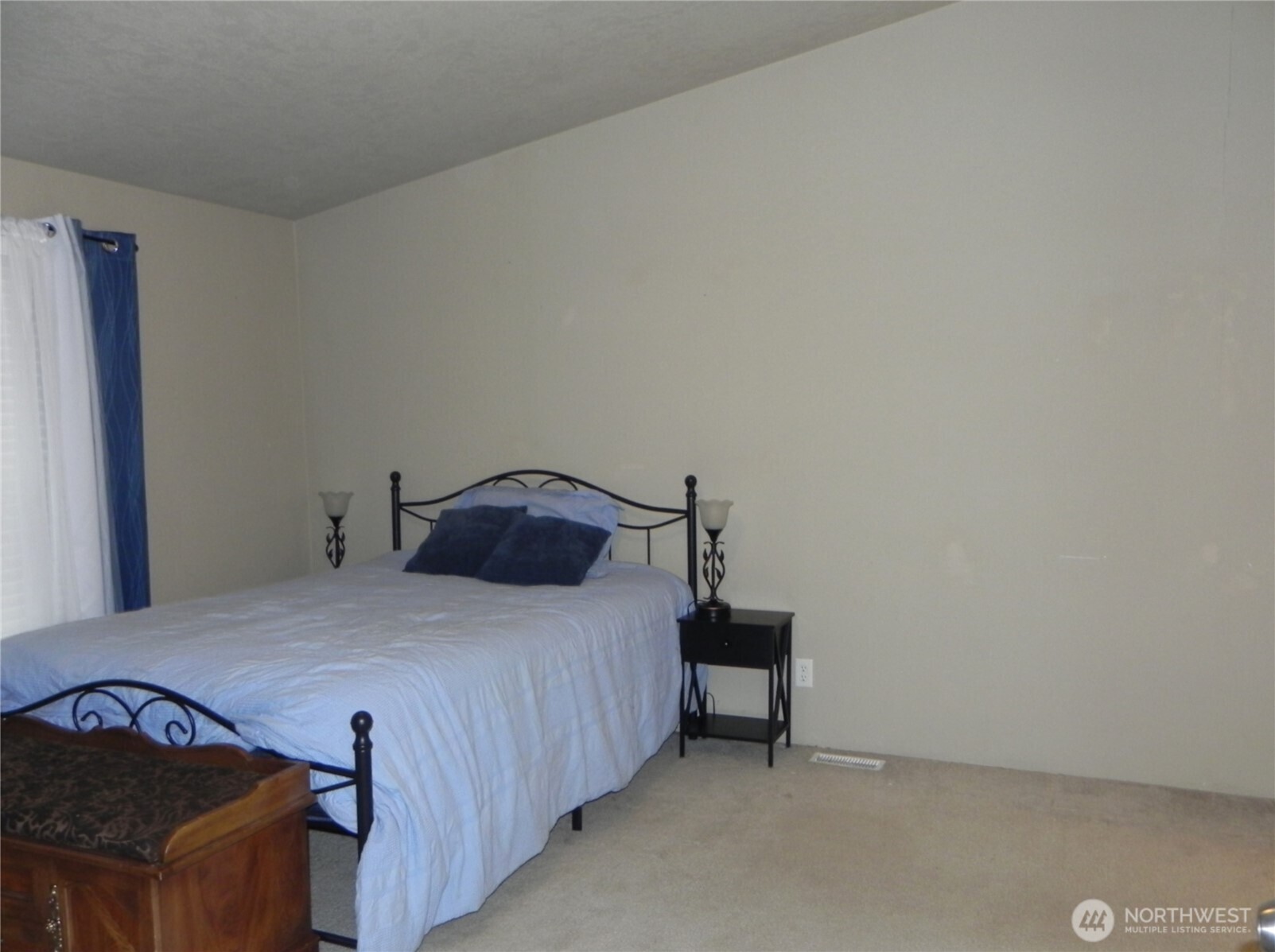 230 Silver Street Republic, WA 99166 - Photo 15 of 25 a bedroom with a bed and a window