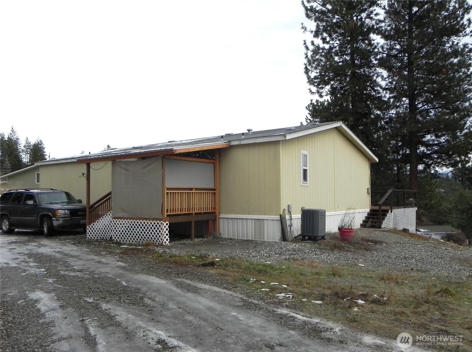 230 Silver Street Republic, WA 99166 - Photo 20 of 25 a view of a house with backyard and a tree