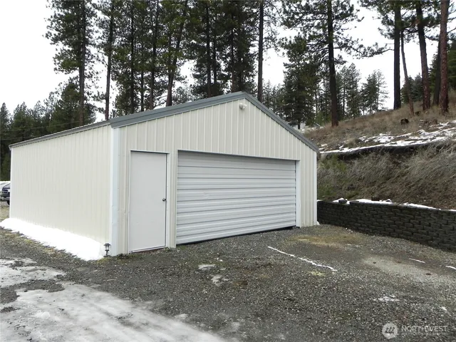 a view of a backyard of the house