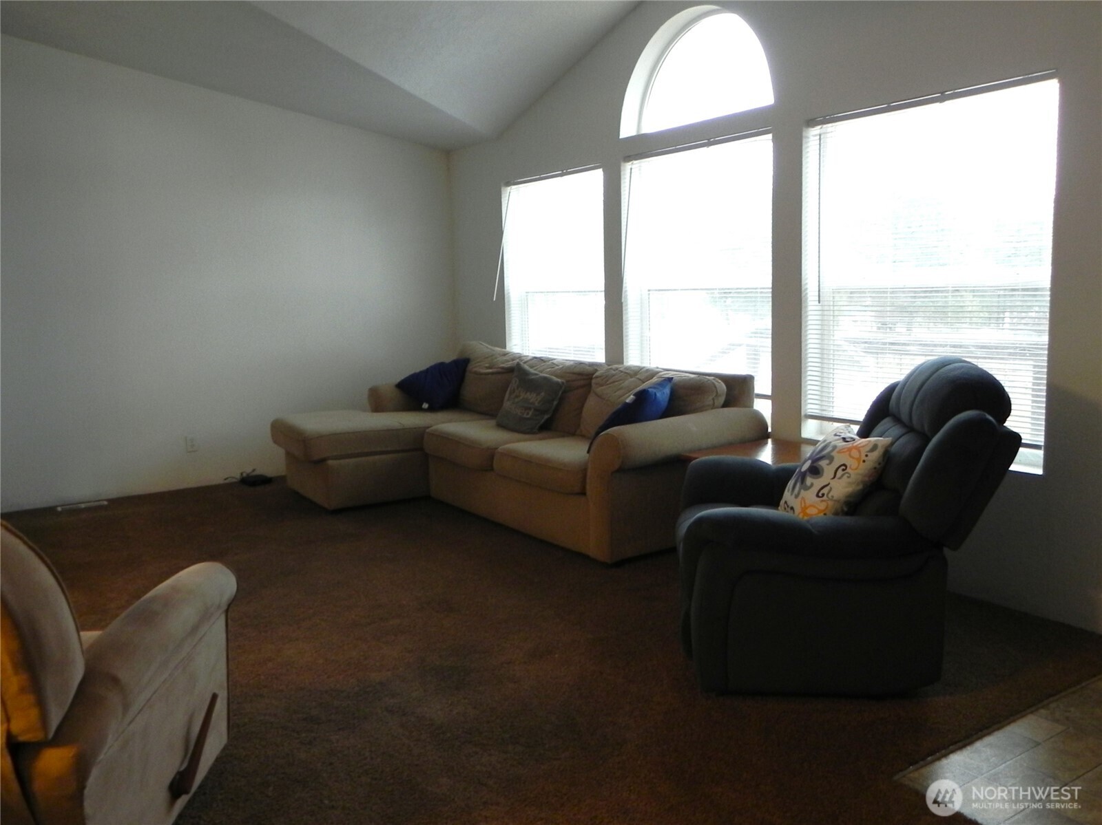 230 Silver Street Republic, WA 99166 - Photo 6 of 25 a living room with furniture and a large window