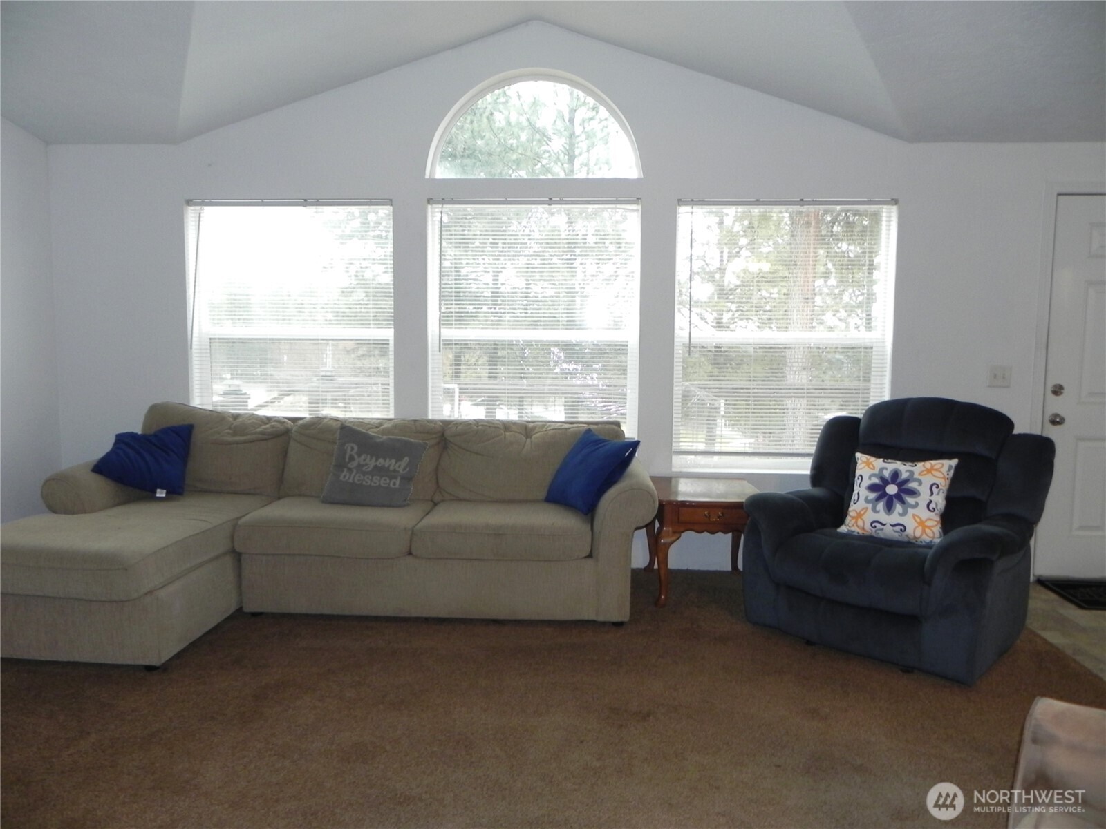 230 Silver Street Republic, WA 99166 - Photo 7 of 25 a living room with furniture and a large window