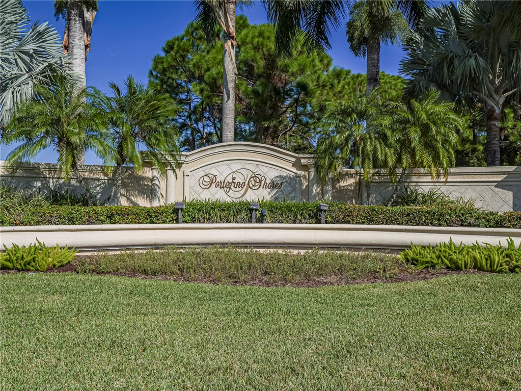 6258 Arlington Way Fort Pierce, FL 34951 - Photo 33 of 36 a front view of a house with a garden