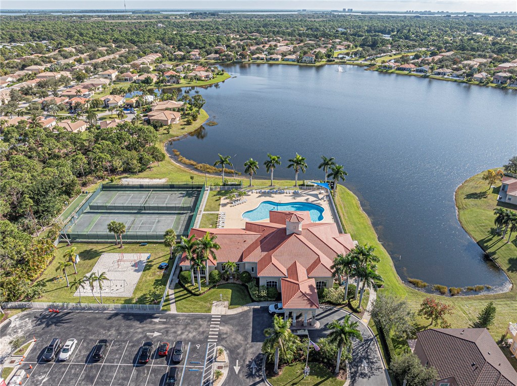 6258 Arlington Way Fort Pierce, FL 34951 - Photo 36 of 36 an aerial view of a house with a lake view