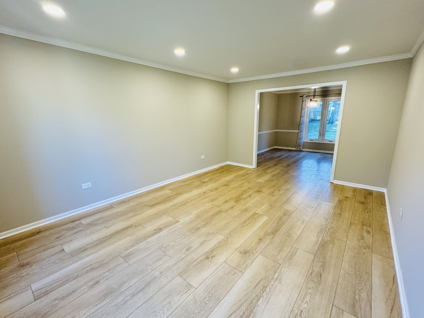 1398 East Gartner Road Naperville, IL 60540 - Photo 2 of 31 an empty room with wooden floor and closet