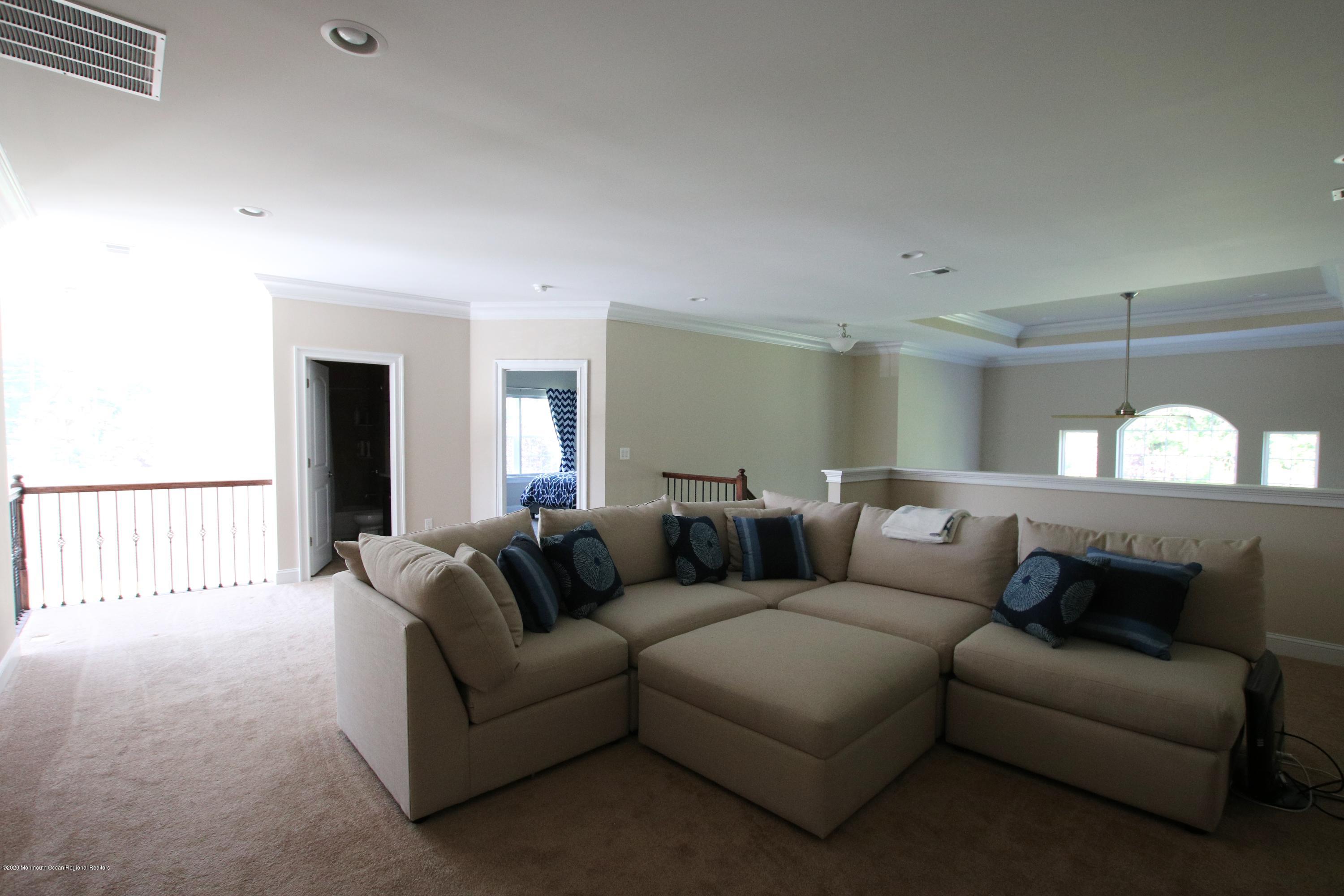 12 Abbey Road Tinton Falls, NJ 07753 - Photo 15 of 24 Lofted Rec Room - View 1
