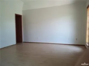 a view of a porch with furniture and garden