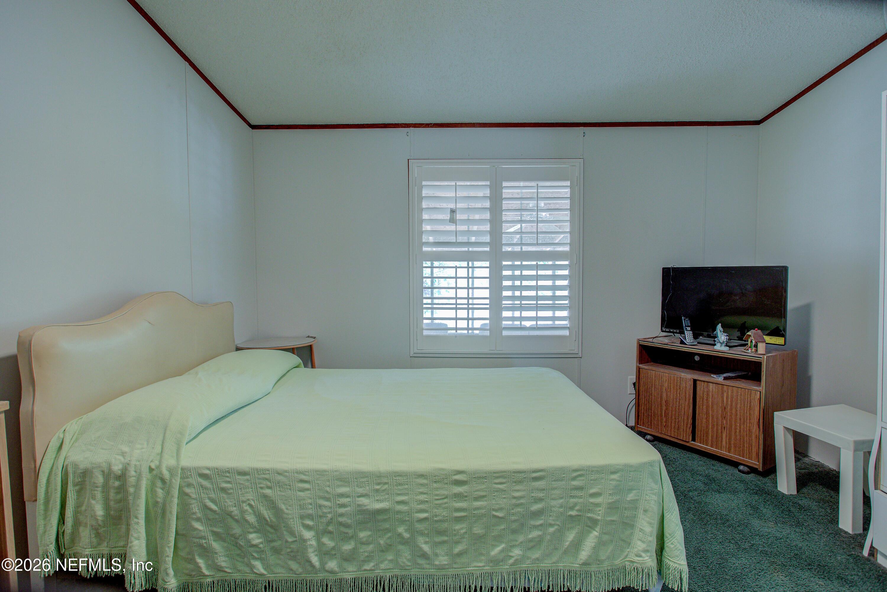 28050 Roundup Place Hilliard, FL 32046 - Photo 32 of 43 20260402-28050_Roundup_Pl-61