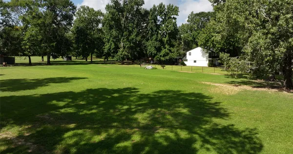 a view of a house with a swimming pool