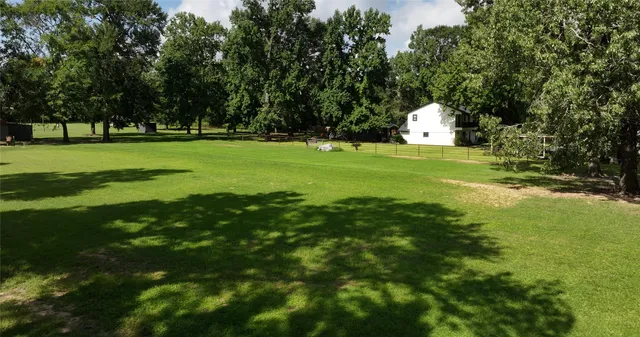 a view of a house with a swimming pool