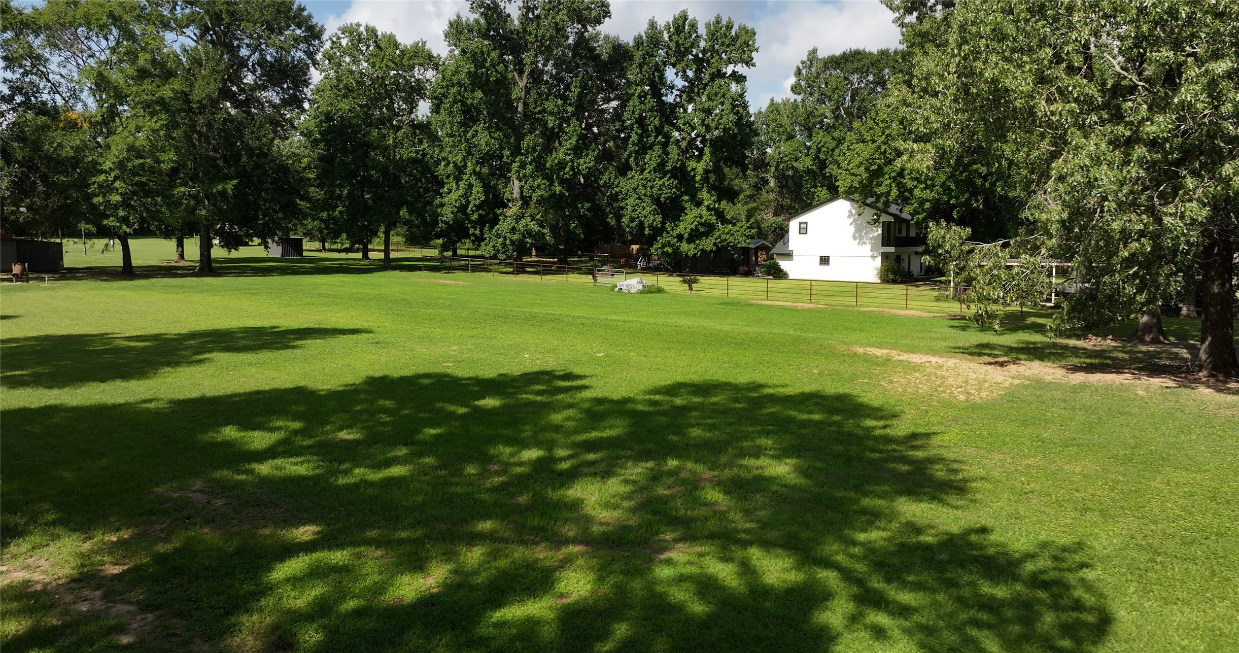 11291-2 Darby Loop Conroe, TX 77385 - Photo 11 of 18 a view of a golf course with a trees