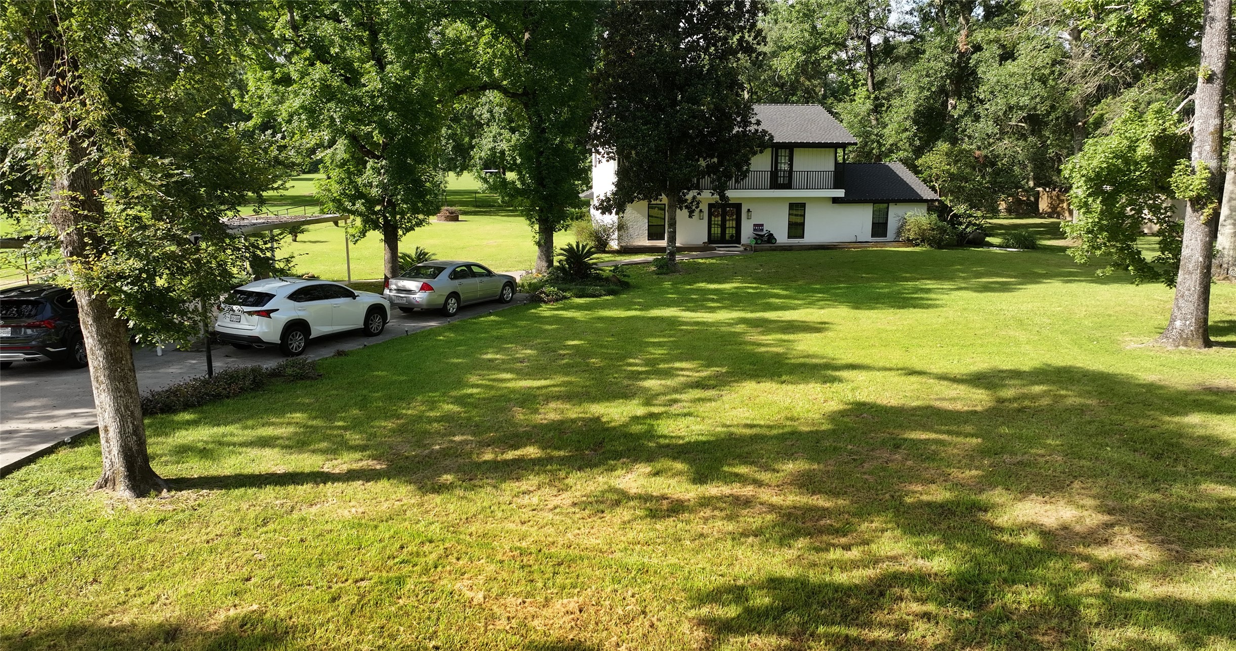 11291-2 Darby Loop Conroe, TX 77385 - Photo 13 of 18 a view of a house with a swimming pool