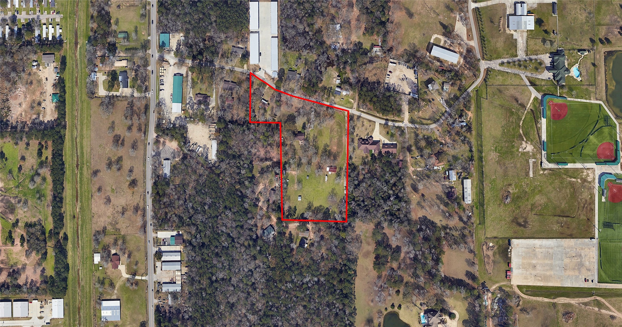 11291-2 Darby Loop Conroe, TX 77385 - Photo 6 of 18 a view of a pathway of a building