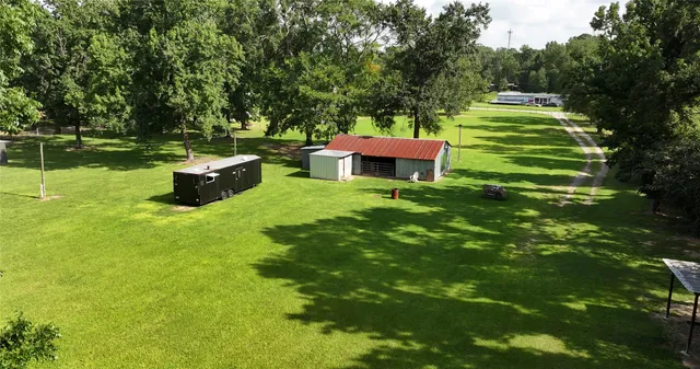 a view of a golf course with a trees