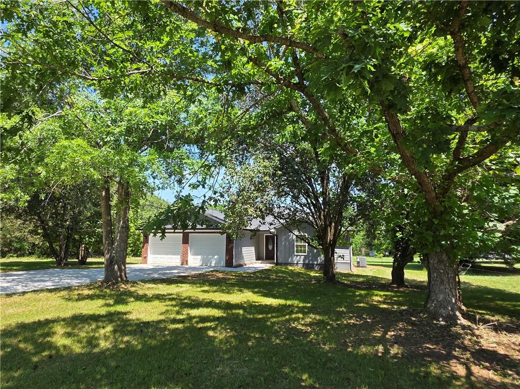279 Taff Road Taylorsville, GA 30178 - Photo 35 of 36 a view of a house with a yard
